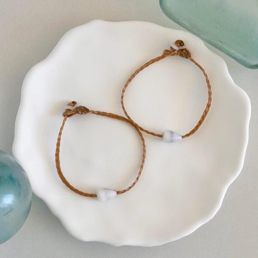 Customizable Hawaiian Marriage Cone shell braided bracelet.